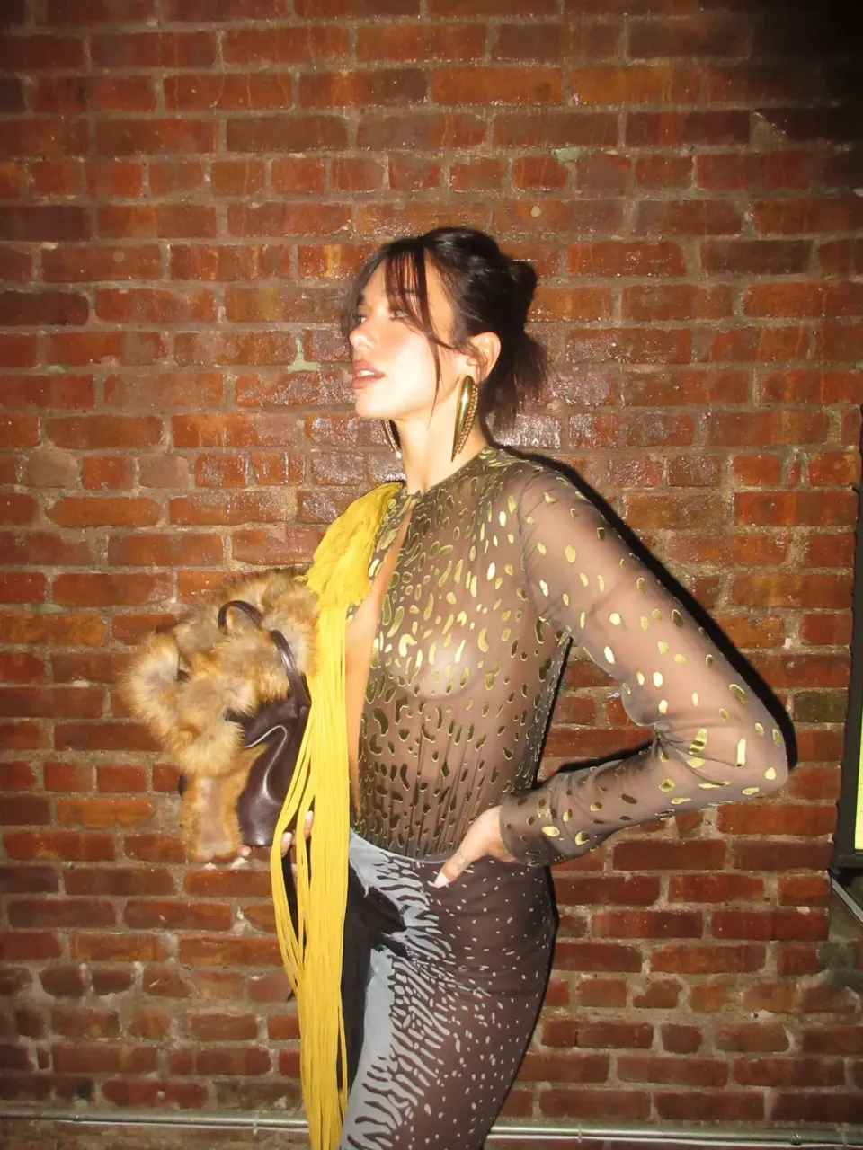 Η Dua Lipa επαναπροσδιορίζει το sheer dressing με look Ferragamo Spring/Summer 2026 4 dualipa 1765465096 3785318042423841871 12331195