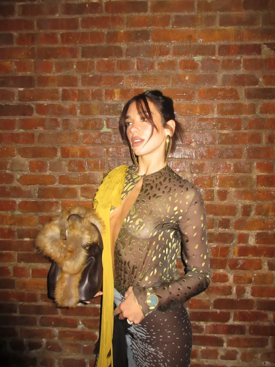 Η Dua Lipa επαναπροσδιορίζει το sheer dressing με look Ferragamo Spring/Summer 2026 2 Dua Lipa sheer dressing