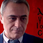 Ο Κυριάκος Παυλίδης με έκφραση βαθιάς απόγνωσης και οργής, καθώς συνειδητοποιεί την εμπλοκή των γιων του στον υπόκοσμο, στη σειρά Άγιος Έρωτας.