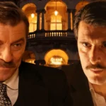 Ο Ρήγας με χειροπέδες μέσα στο κελί, αντιμέτωπος με την οργή του Χατζημήτρου στα νέα δραματικά επεισόδια της σειράς Grand Hotel.